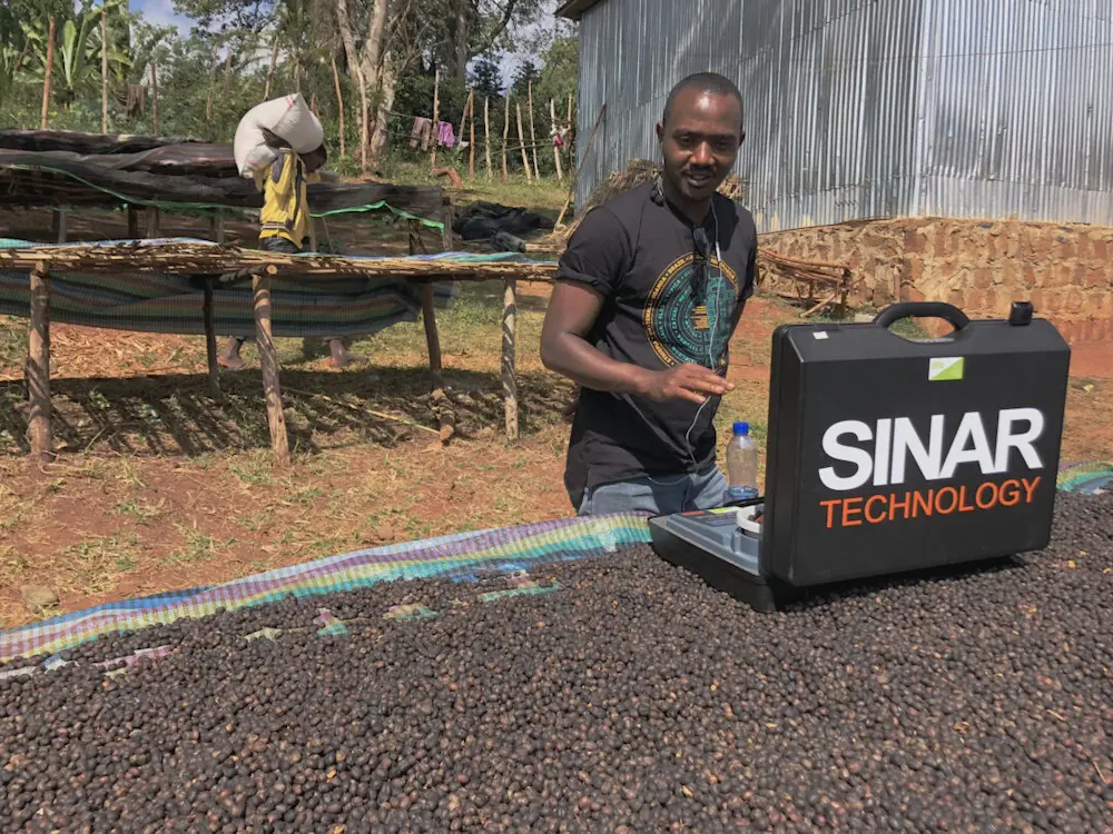Providing a Sinar Moisture Analyser to regulate cherry quality during processing and drying phases to the community in Guji Ethiopia as part of our community projects