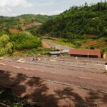 View of coffee cherries drying and Intango Washing Station in Rwanda