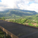 Scenic mountain view at Tio Juan in Honduras with natural process cherries drying under sun