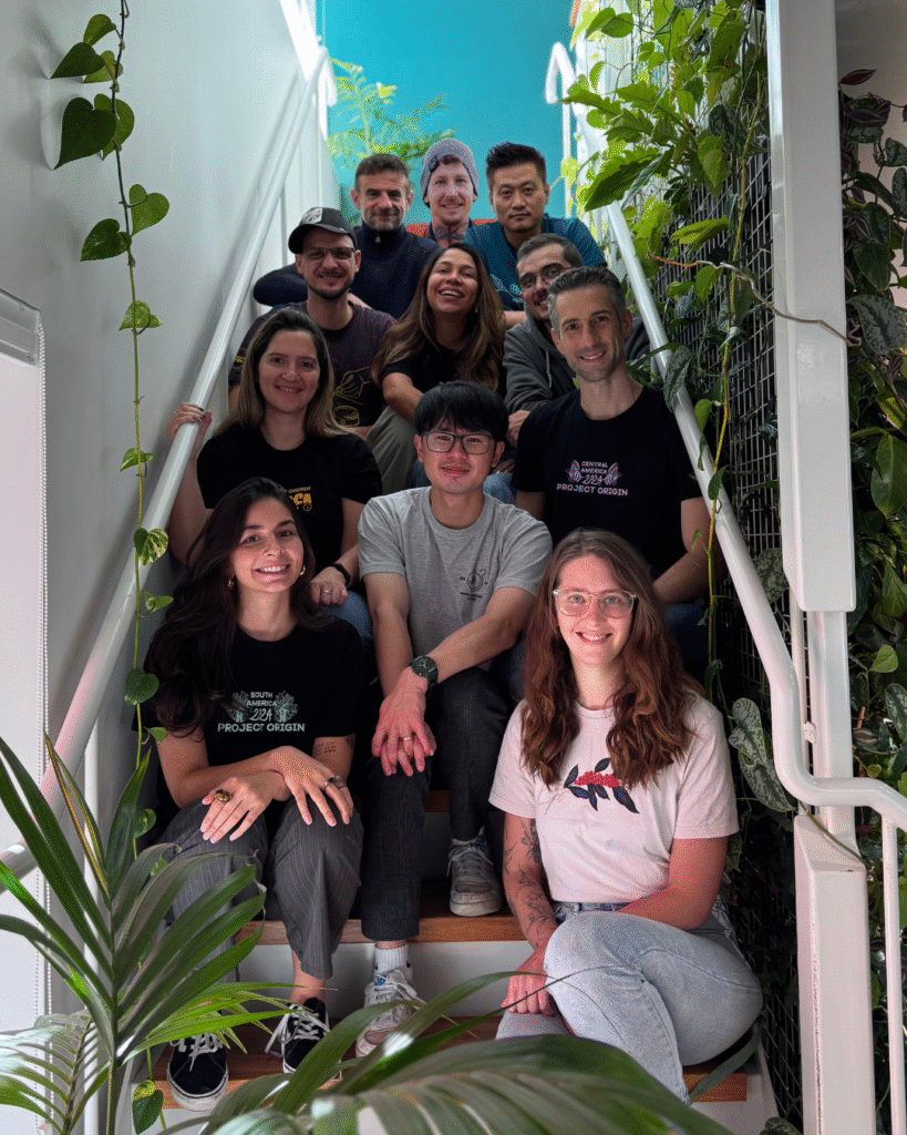 Team photo stacked on the stairs.
